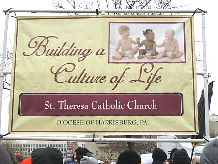 Banner proclaims: 'Building a Culture of Life'