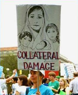 Protest sign shows woman and her three children, described as 'Collateral Damage'