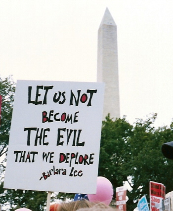 Sign at antiwar march: 'Let Us Not 
Become the Evil that We Deplore'