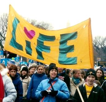 Marchers with LIFE banner