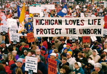 Banner: 'Michigan Loves Life/Protect the Unborn'