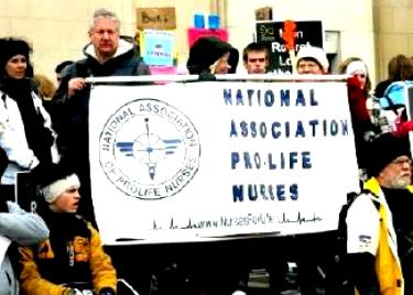 Nurses with banner: 'National Association Pro-Life Nurses'